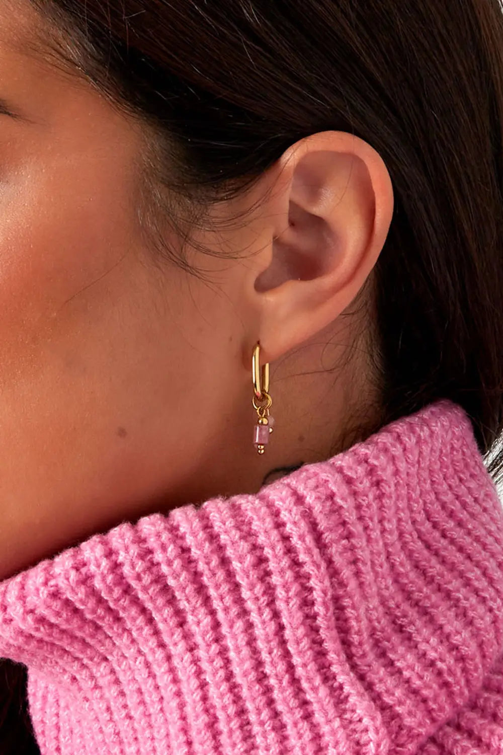Oorbel met roze kralen